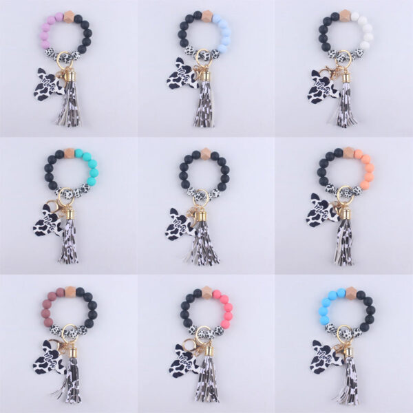 O1CN01ILOBwX1NrNdq5Eg8M__2214899881623-0-cib Wholesale MAMA Wood Chips Cow Head Western Style Silicone Beads Wrist Keychain