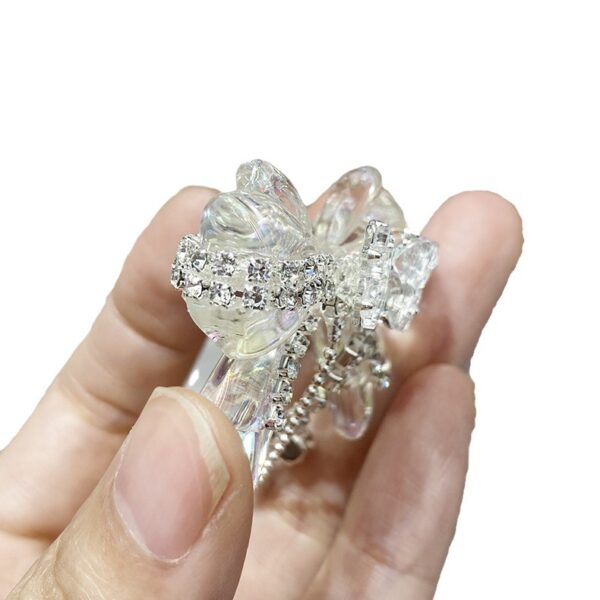 O1CN01IQtcFb1R1rbXz7nNH_2216318702052-0-cib-1 Wholesale Acrylic White Diamond Chain Bow Straight Hole Beads