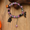O1CN01IUUhXh1sweKFBt7Xs_2213363735831-0-cib Wholesale Halloween pop flower wafer beads pumpkin castle bat tassel kids glass bracelet