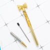 O1CN01IomJPF1mwIAyrncl2_1133525018-0-cib Wholesale Metal Gold Powder Into The Oil Bow Ballpoint Pen