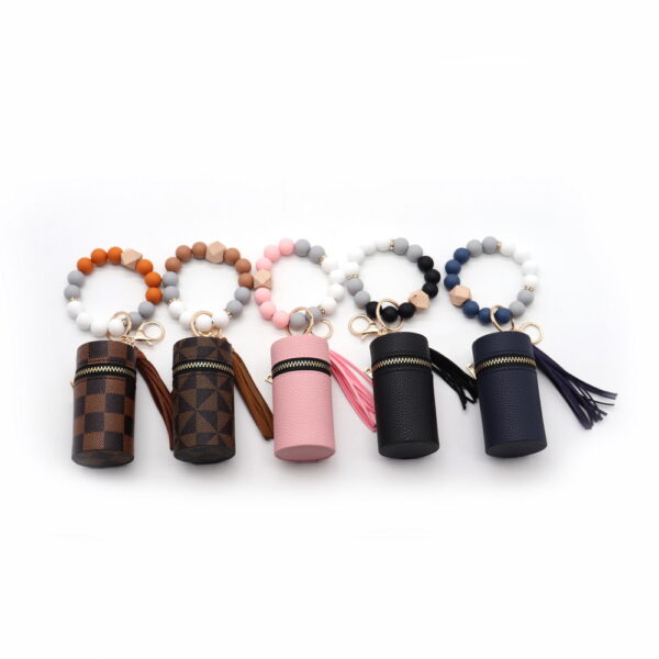 Wholesale Silicone Coin Purse Small Bag Mini Lipstick Earphone Keychain