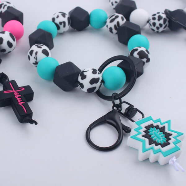 Wholesale Cartoon Bull Head Aztec Cross Silicone Beaded Wrist Keychain