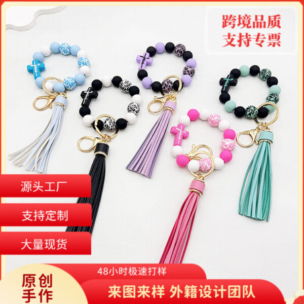Wholesale Leopard Cross Silicone Beaded Tassel Wrist Keychain
