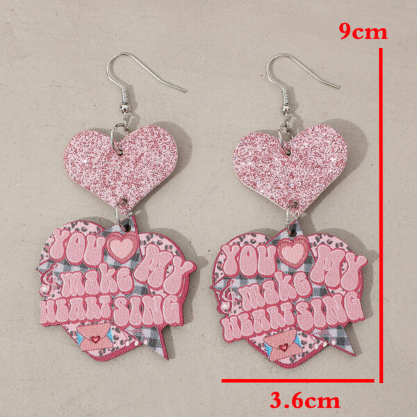 O1CN01JJKAK71qyMbIfbHgB_2206372095564-0-cib Wholesale Valentine's Day Cartoon Pink Glitter Heart Hanging Letter Leather Earrings