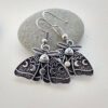 O1CN01JPC00f1EYkzmobpaJ_2215129220364-0-cib Wholesale Gothic Silver Moth-alloy Earrings with Moon and Sun Pattern Alloy Earrings
