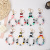 O1CN01JWqe6R1FGj2aNJZEN__2949020460-0-cib Wholesale Rubber Tassel Silicone Wood Water Keychain
