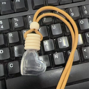 6ml; five-line cap with brown and yellow rope - small heart; glass + wood