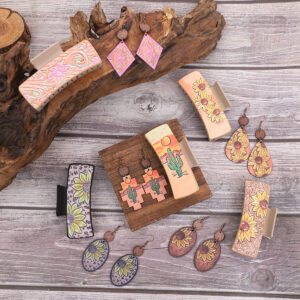 O1CN01JleZjh1ftMV5vwlvb__3172764064-0-cib Wholesale Western Style Sunflower Cactus Leather Hair Clip Earrings Set