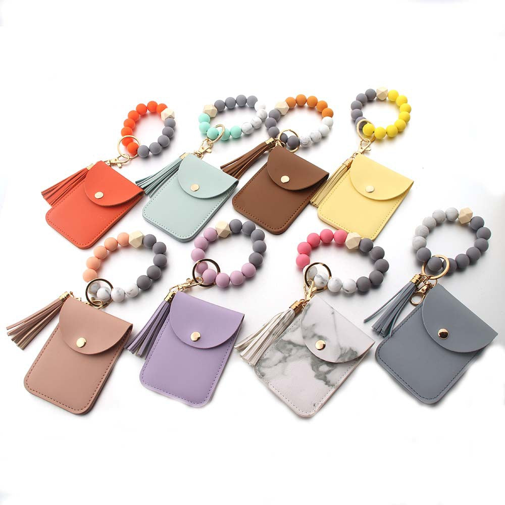 Wholesale Silicone Leather Tassel Bracelet Wooden Bead Keychain