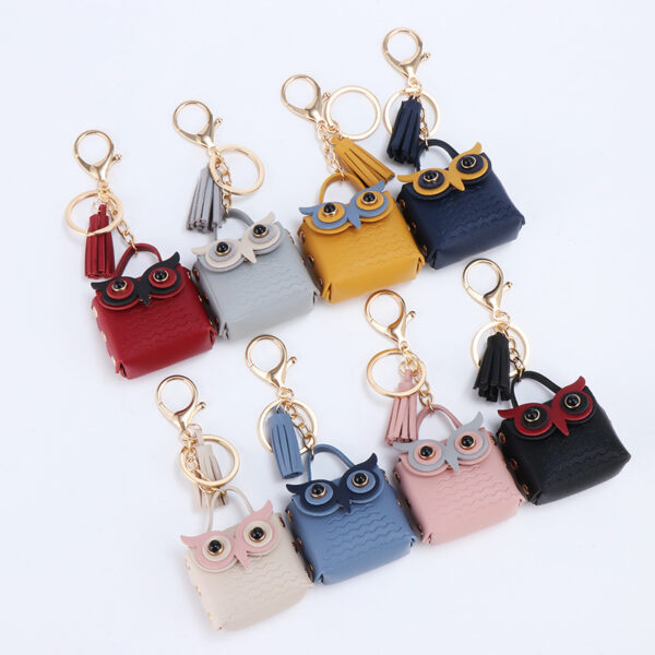 Wholesale Owl Bluetooth Headphones Artificial Leather Storage Bag Keychain