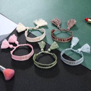 O1CN01K004Vk1Q0CJrtRMhA__6000000001913-0-cib Wholesale Vintage Bohemian Embroidered Letter Woven Tassel Bracelet