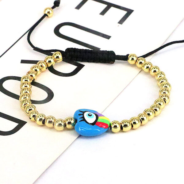 O1CN01KEQMvb1DoUwzZHPKW_2208521520263-0-cib Wholesale Drip Oil Plastic Heart Shape Devil's Eye Copper Bead Braided Bracelet