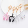 Wholesale Spray Painted Earphones with Diamonds, Cute Bag Pendants, Alloy Keychains