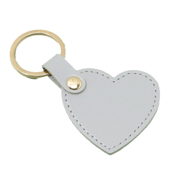 O1CN01KTXEnq1mWeOjT0bAH_6000000004962-0-cib Wholesale Creative Heart Shaped Leather Keychains