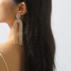O1CN01Kqsrba1X6nZDvCG22_1768642875-0-cib Wholesale U-shaped Full Diamond Tassel Earrings