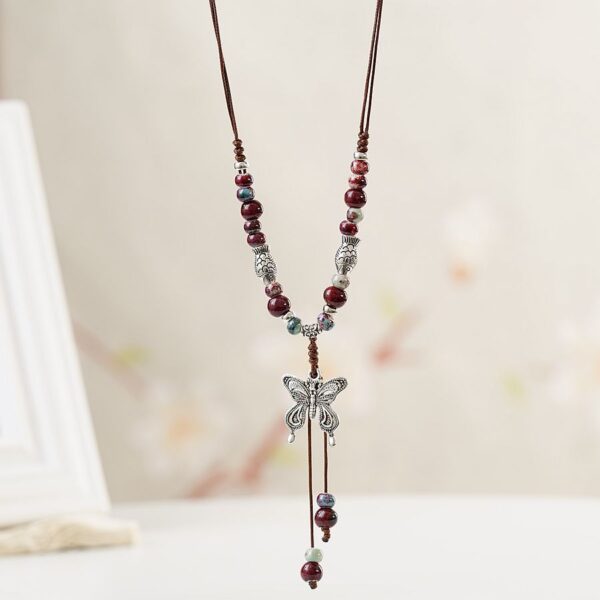 O1CN01LA0Mpr1iNhryFXFwW_2156504401-0-cib Wholesale Jewelry Butterfly Long Ceramic Beads Necklace