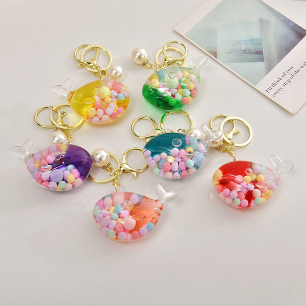 Wholesale Oil Bottle Floating Sugar Bean Whale Acrylic Liquid Keychain