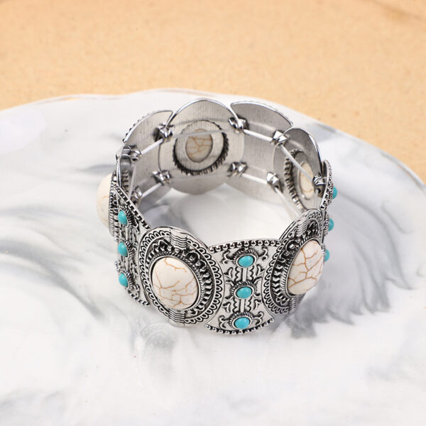 O1CN01LL1YYo1jhgnd3x2ie_2215436944580-0-cib Wholesale Hollow Inlaid Turquoise Alloy Bracelet