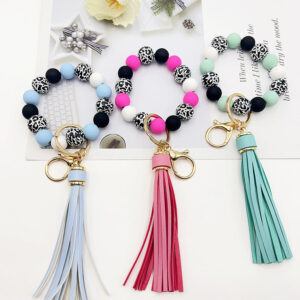 Wholesale Leopard Print White Bottom Wooden Beads Rubber Paint Round Beads PU Tassel Bracelet Keychain