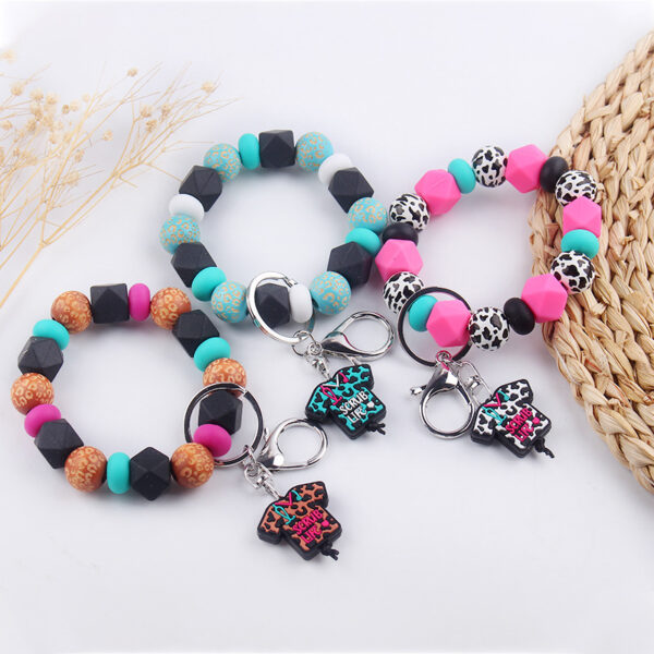 Wholesale Cartoon Nurse Uniform Silicone Beaded Wrist Keychain