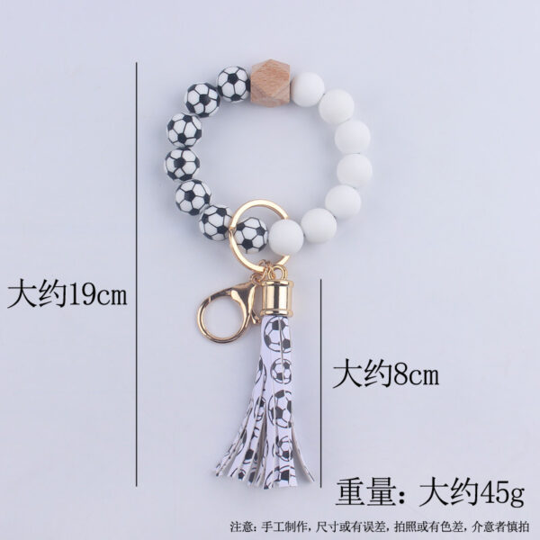 O1CN01LUGUln1NrNe8bckkG_2214899881623-0-cib-1 Wholesale Football Silicone Beaded Wrist Keychain