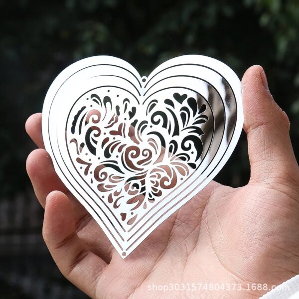 O1CN01Lb095o1ZeLpuI6Peu_2216867883219-0-cib Wholesale 3D Pulsating Heart-shaped Rotating Stainless Steel Wind Chimes
