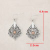 Wholesale Bohemian Retro Style Teardrop-shaped Hollow Pattern Inlaid Gem Alloy Earrings