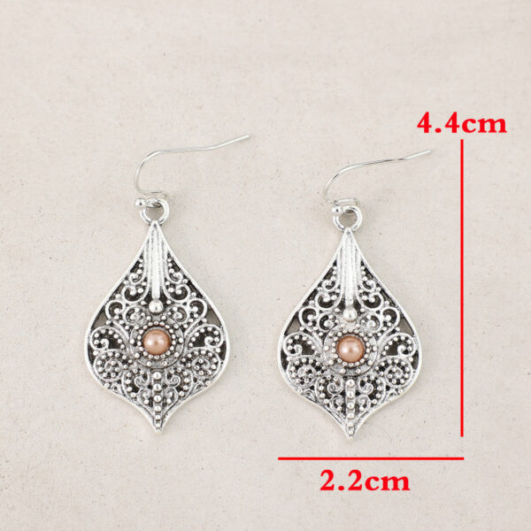 Wholesale Bohemian Retro Style Teardrop-shaped Hollow Pattern Inlaid Gem Alloy Earrings