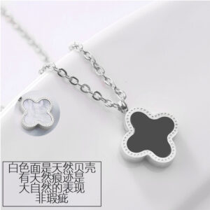 Black and white double-sided four-leaf clover