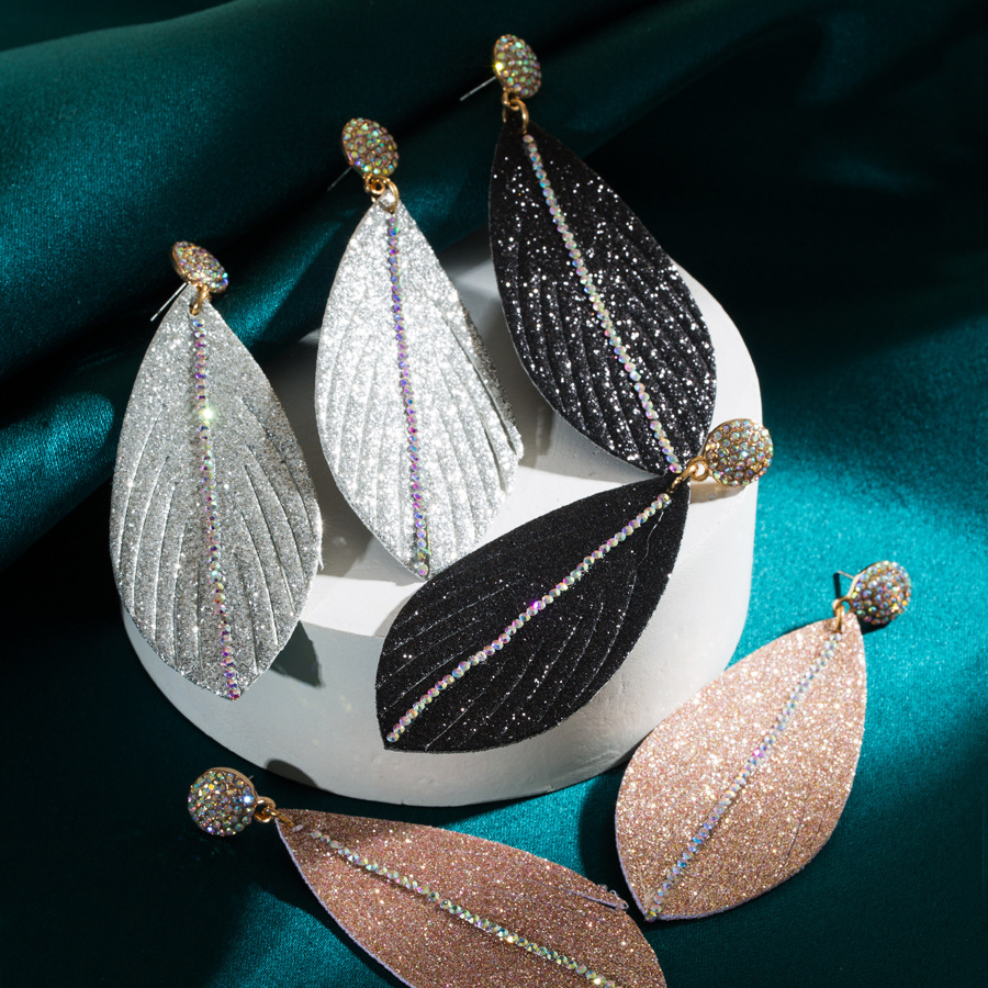 Wholesale European and American personality trend leather earrings female alloy diamond leaf-shaped pendant exaerated earrings temperament banquet ear