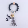 O1CN01MQ3L1J1NrNeVTpgVD_2214899881623-0-cib Wholesale MAMA Wood Chips Cow Head Western Style Silicone Beads Wrist Keychain