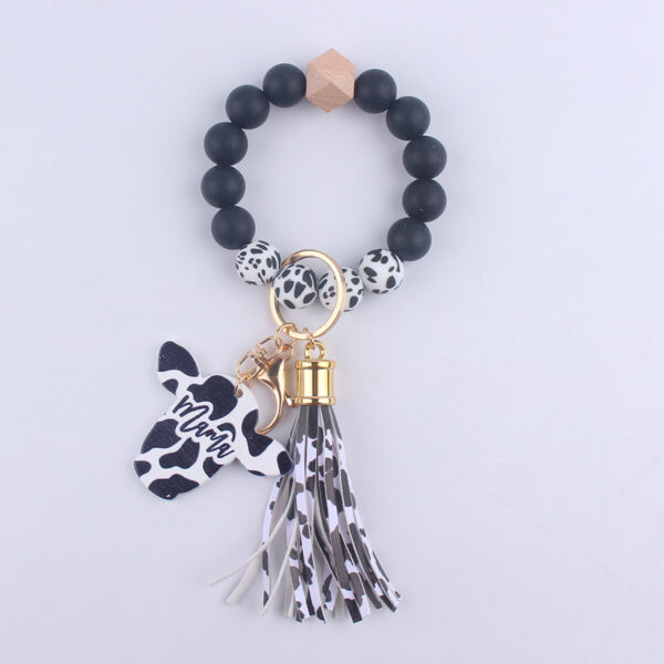 O1CN01MQ3L1J1NrNeVTpgVD_2214899881623-0-cib Wholesale MAMA Wood Chips Cow Head Western Style Silicone Beads Wrist Keychain
