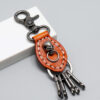 O1CN01MTm8Fc23CLucNKNAa_954827219-0-cib Wholesale Alloy Wings Leather Keychain