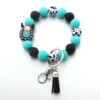 O1CN01N2WVgt1bYW4rOSmxa_2216822363477-0-cib Wholesale Cartoon Animal Western Cowboy Silicone Tassel Bracelet Keychain