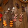 O1CN01N7yleG1WVhafu9FWA_3379762794-0-cib Wholesale Halloween Printed Colorful Pumpkin Skull Ghost Gift Creative Splicing Wooden Earrings