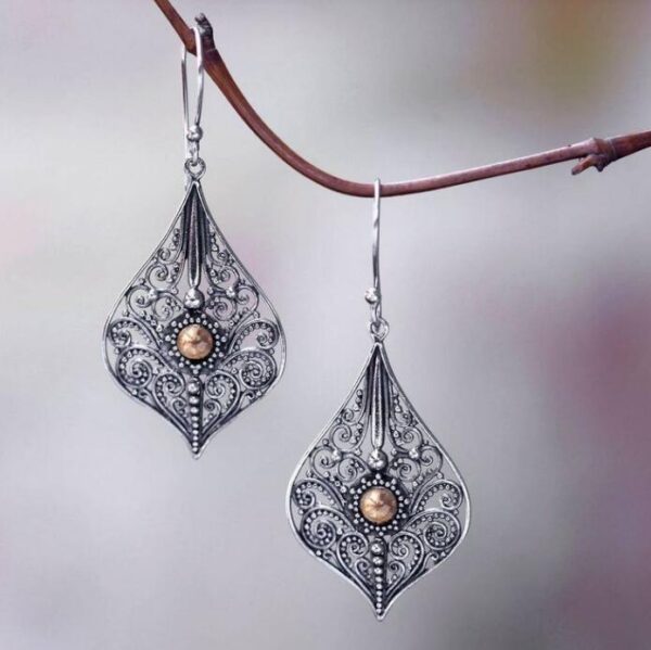 Wholesale Bohemian Retro Style Teardrop-shaped Hollow Pattern Inlaid Gem Alloy Earrings