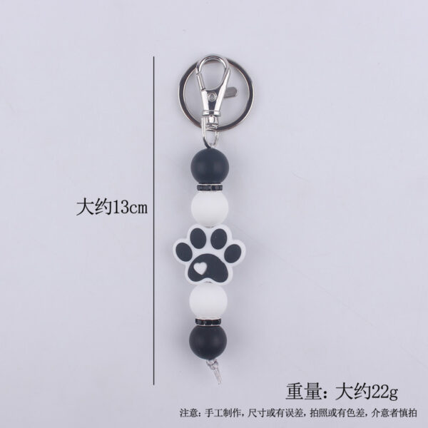 O1CN01NRIXi71NrNgM7kN00_2214899881623-0-cib Wholesale Cartoon Dog Paw Silicone Handmade Beaded Keychain