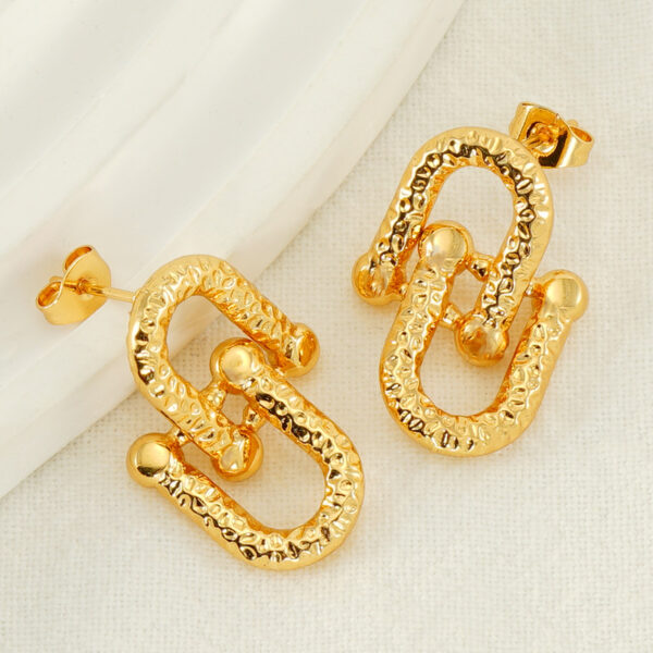 O1CN01NXoxj31p57DT6N4xR_2206851935308-0-cib Wholesale Stainless Steel Geometric Interlocking Gold Plated Earrings