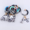 O1CN01NmKob41NrNditoJY3_2214899881623-0-cib Wholesale MAMA Wood Chips Cow Head Western Style Silicone Beads Wrist Keychain