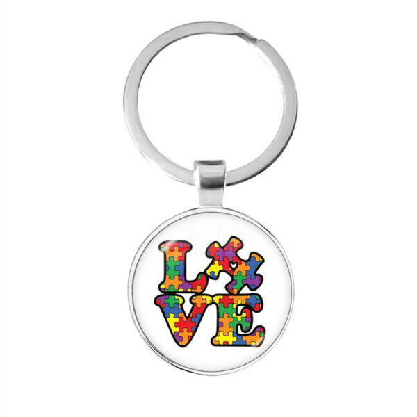 O1CN01OAWMrB1tijojrnqFJ_2212752275936-0-cib Wholesale Alloy Autism Ribbon Love Keychain