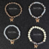 Wholesale Four Layer Butterfly Pendant Glass Elastic Bracelet