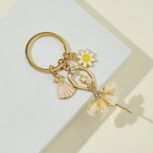 O1CN01OCH9j21bFjfKt3Q4J__2857743436-0-cib_b8bd08b7-545f-4cd0-ad98-9e81ba93bbde Wholesale Alloy Dancing Girls Alloy Key Chain