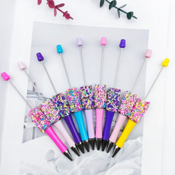 O1CN01OL383A1WH2ucKap08__2215718862762-0-cib Wholesale DIY Colored Sugar Colored Sugar Needle Sugar Cute Grains Colored Chocolate Candy Beads Ballpoint Pen