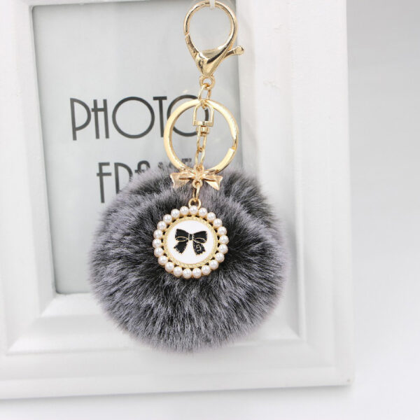 O1CN01Oc2bVs1X3abK5rOTy_2038122868-0-cib Wholesale New Bow Tag Imitation Rex Rabbit Fur Plush Ball Keychain