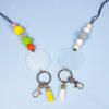 O1CN01Oyaqgp2HAtGU4sC97_2204163699111-0-cib Wholesale Silicone Beaded Wooden Sign Acrylic Lanyard Keychain