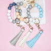 O1CN01PS98dz1bFjcs7fQLG_2857743436-0-cib-1 Wholesale Wood Imitation Silicone Beads Tassel Wrist Keychain