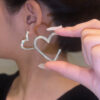 O1CN01PYAyBN1jNXM6XtNyW_3551054536-0-cib Wholesale Micropaved Zirconia Love Heart Earrings