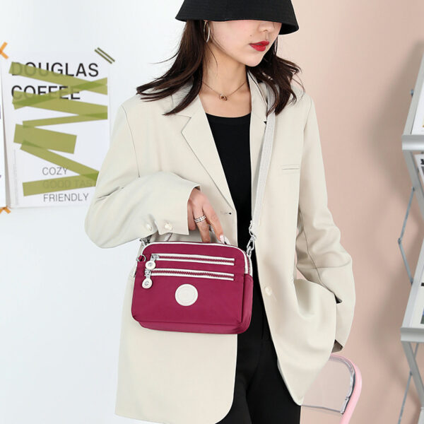 O1CN01PuBWXG1tiHOkITdMe_2210908415935-0-cib Wholesale New Simple Contrast Color Messenger Nylon Shoulder Bag