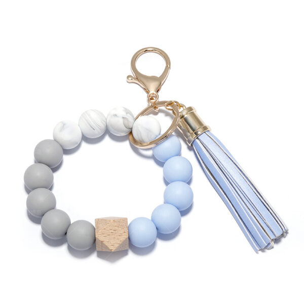 O1CN01Pvch2H1iSk7tjVkoI_3527034412-0-cib-1 Wholesale Silicone Beaded PU Leather Tassel Wristlet Keychain