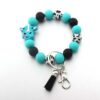 O1CN01Pzm5iN1bYW4uJhRSc_2216822363477-0-cib Wholesale Cartoon Animal Western Cowboy Silicone Tassel Bracelet Keychain